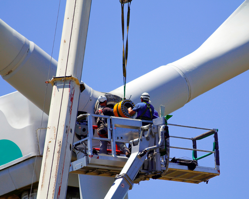 trade worker repairing wind turbine (WTG)